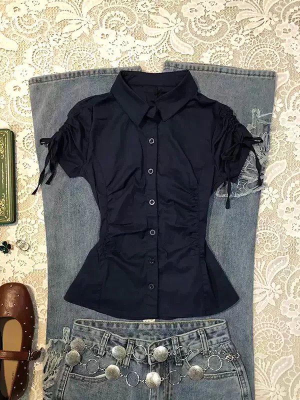 blue waisted short-sleeved shirt