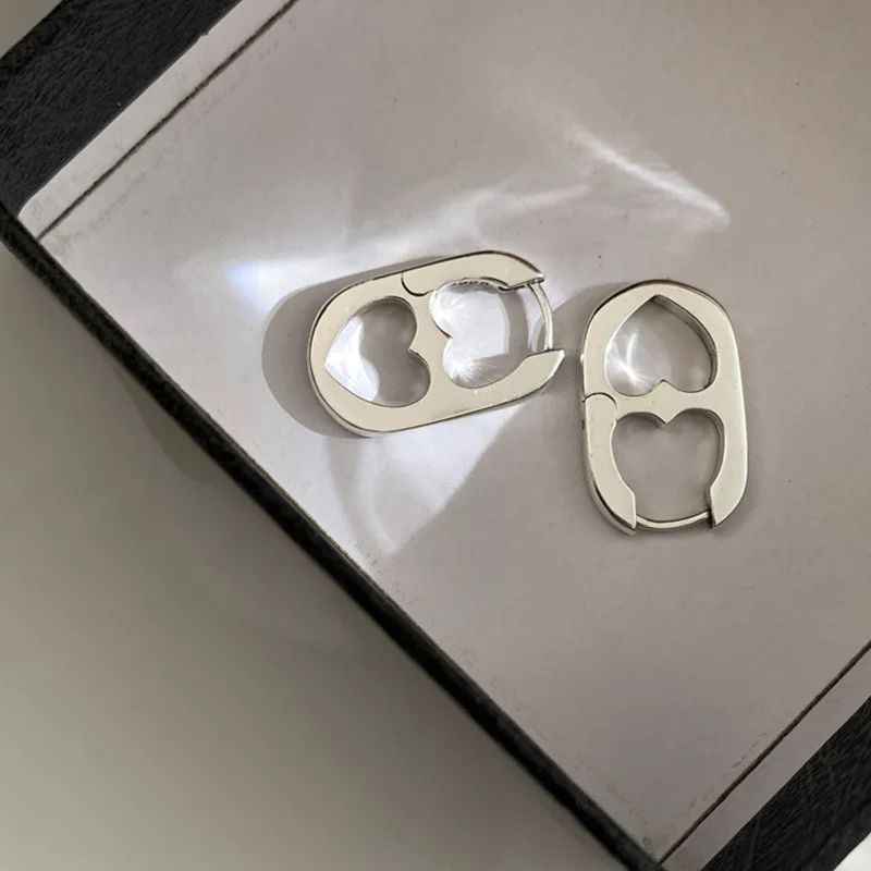 Silver Hollow Double Heart Earrings - Image 2